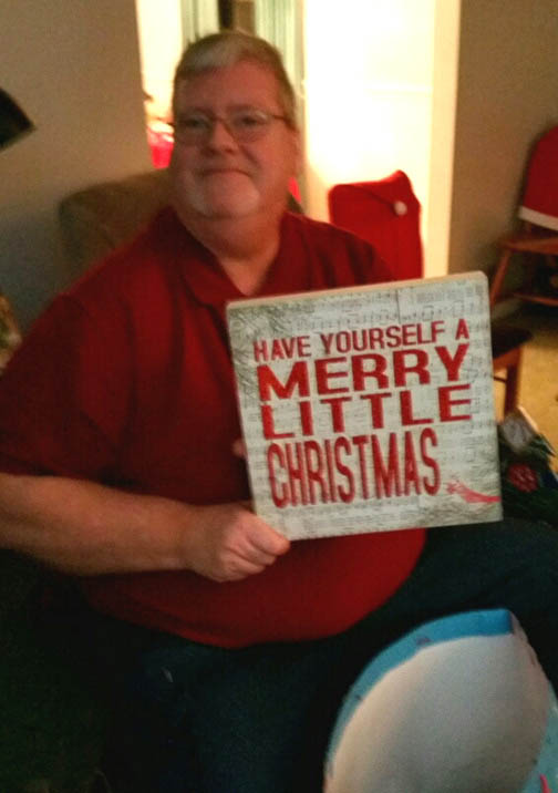 A99 JIM WITH GIFT WISHING ALL OF YOU A MERRY LITTLE CHRISTMAS