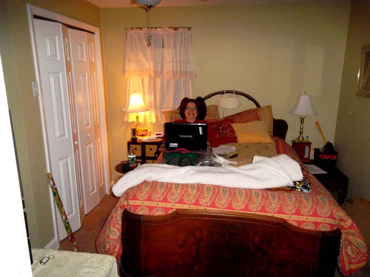 Christmas Eve 2012 - Kathy in apartment bedroom