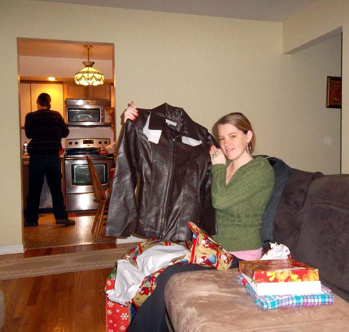Christmas Eve 2012 - Melissa opening her present from Jack