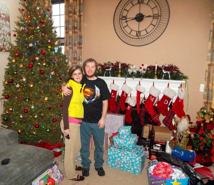 Christmas z Day 2012 - 2 Dianna and Robby in front of tree at Robins House