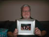 Christmas z Day 2012 - 2 Jim with Portrait Gift of grand nephew and neices at Robins House