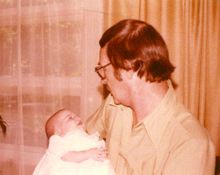 Dad with Megan after Christening in 1979
