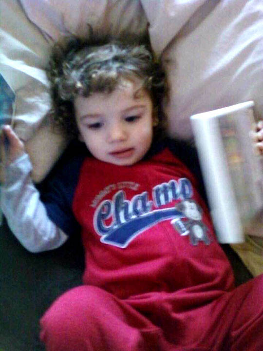 MIKEY IN CHAMP SHIRT AS A TODDLER