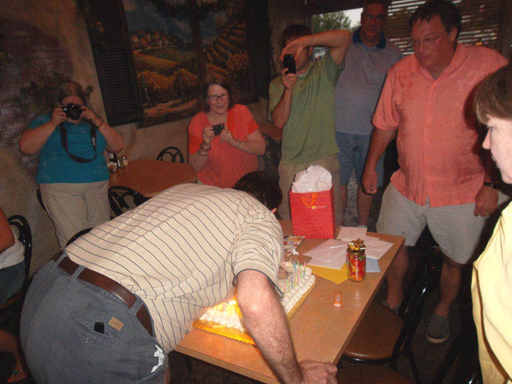 Mickey Kelley 60th B-Day - Mick blowing out Candles