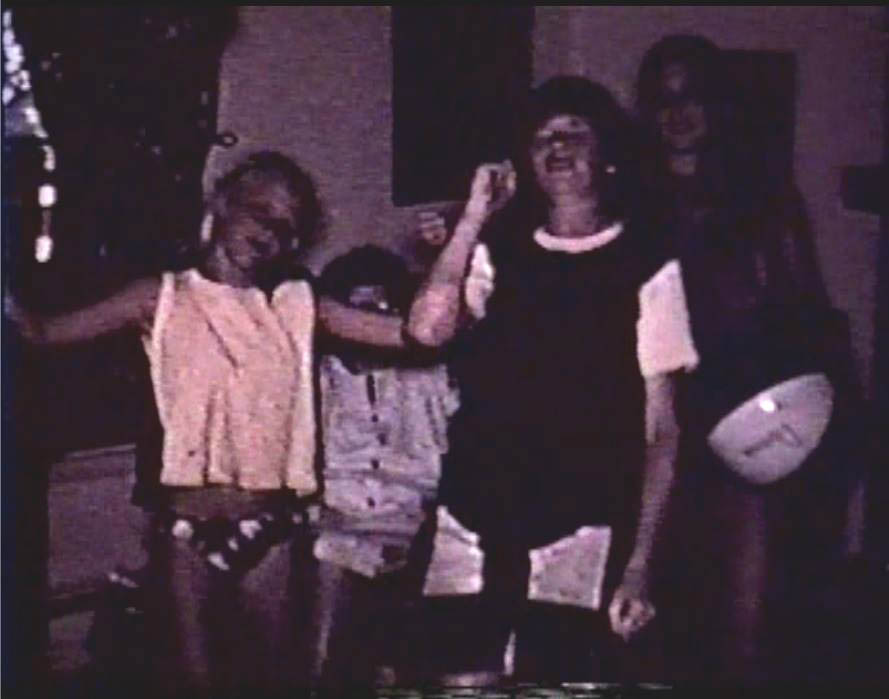 COUSINS JIM KELLEY AND DONNA SNADER WITH GRANDMOM MORGAN FROM AN OLD FAMILY MOVIE SCREENSHOT - 1970s
