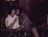 COUSIN CAROLYN SNADER WITH GRANDMOM ELSIE FROM AN OLD FAMILY MOVIE SCREENSHOT - 1970s