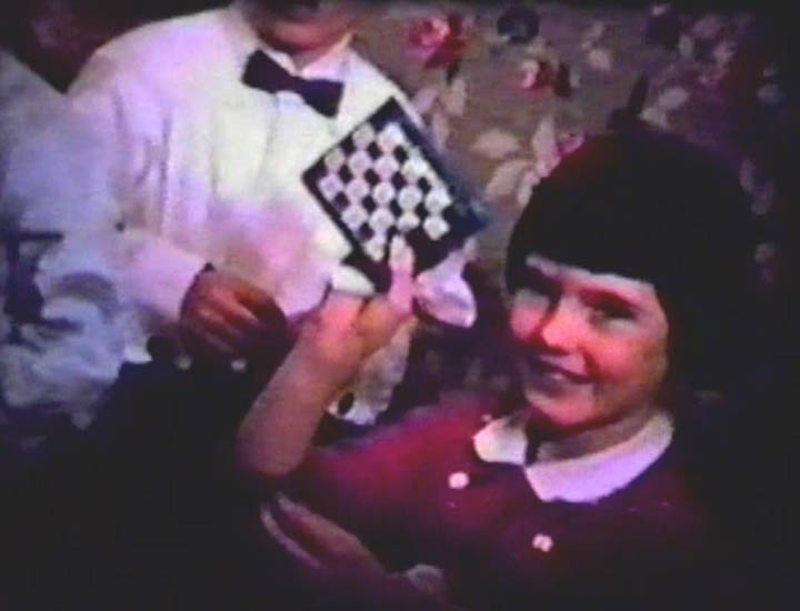 KATHY KELLEY AT HER BIRTHDAY PARTY AT GRANDMOM MORGAN'S FROM AN OLD FAMILY MOVIE SCREENSHOT - 1950s