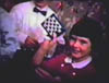 KATHY KELLEY AT HER BIRTHDAY PARTY AT GRANDMOM MORGAN'S FROM AN OLD FAMILY MOVIE SCREENSHOT - 1950s