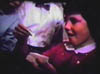 KATHY KELLEY AT HER BIRTHDAY PARTY AT GRANDMOM MORGAN'S HOUSE FROM AN OLD FAMILY MOVIE SCREENSHOT - 1950s