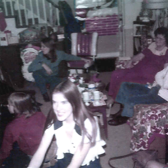 FAMILY WITH GRANDMOM IN DAVE KELLEYS LIVING ROOM AT CHRISTMAS EARLY 1970S