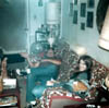 CONNIE AND NICK PANCO IN DAVE KELLEY LIVING ROOM AT VILONE VILLAGE EARLY 1970s