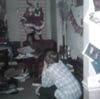 JIM KELLEY OPENING CHRISTMAS GIFTS AT DADS VILONE VILLAGE HOUSE EARLY 1970s