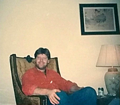 JIM KELLEY IN CHAIR MID 1980S