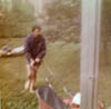 DAVE KELLEY CUTTING GRASS AT HIS VILONE VILLAGE DE HOUSE EARLY 1970S
