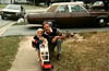 DAVE KELLEY WITH JIS GRANDDAUGHTER LINDSAY EARLY 1980S