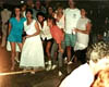 KATHY KELLEY WITH FAMILY AND FRIENDS AT HER WEDDING IN THE MID 1980S